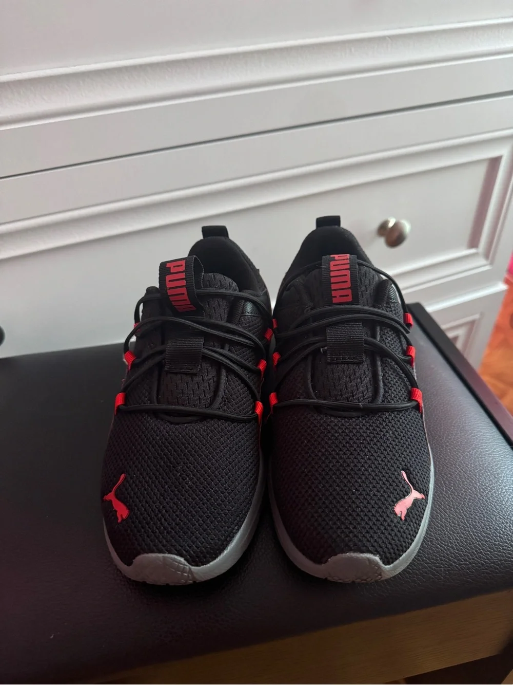 Puma Kids Black Sneakers with Red Accents